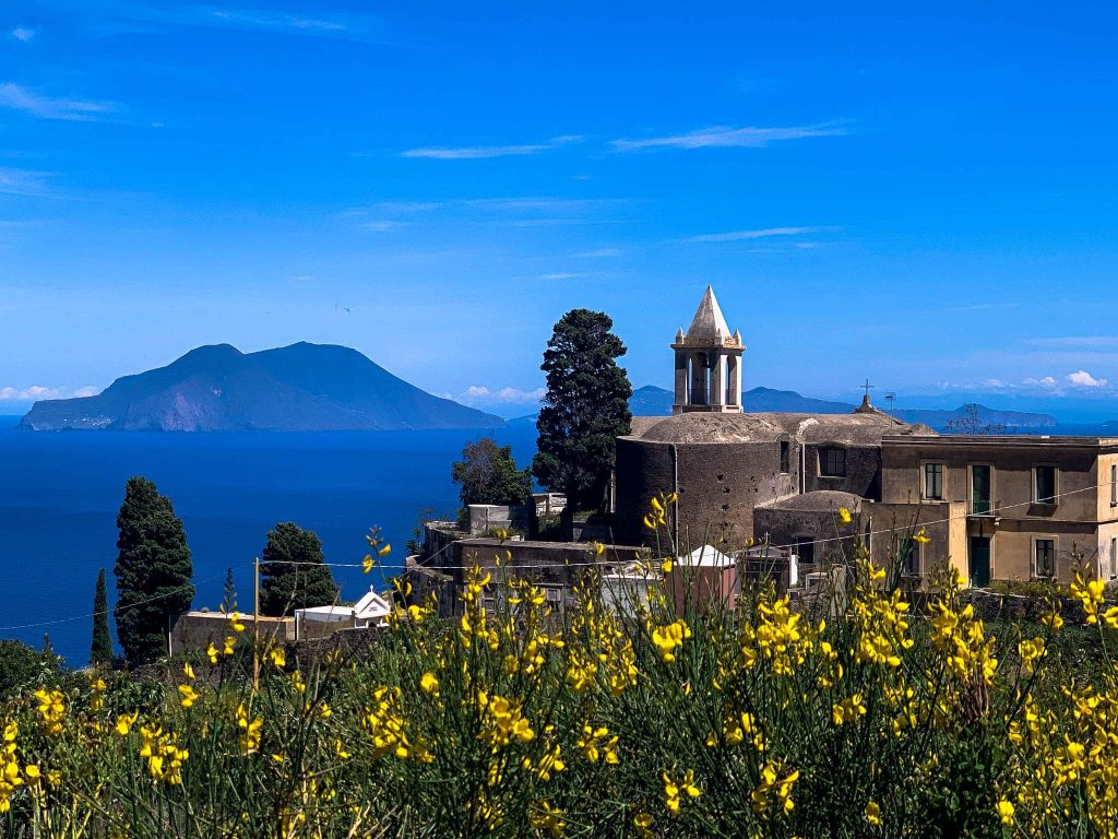 Santo Stefano Filicudi with Salina in the background
